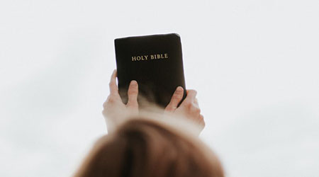 450x250_stockimage-HoldingBible